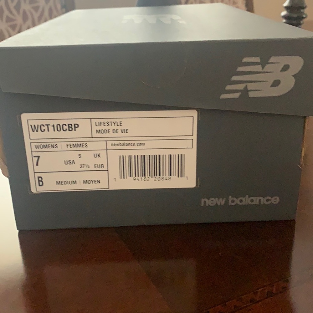 Brand New “New Balance Shoes” never worn in it’s original box. Dress up or down.